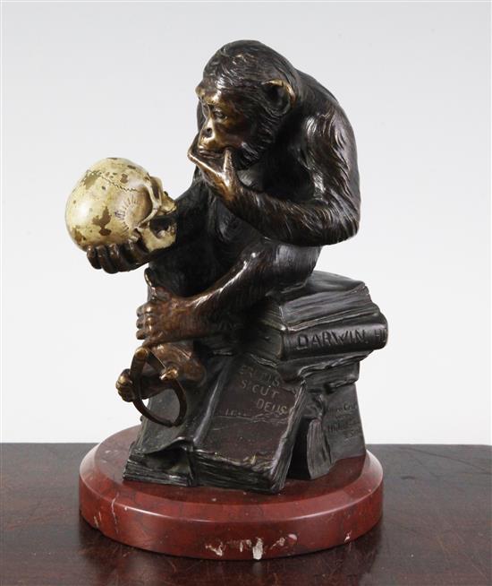 Wolfgang Hugo Rheinhold (1853-1900). A patinated and cold painted bronze sculpture ape with skull, 7.5in.